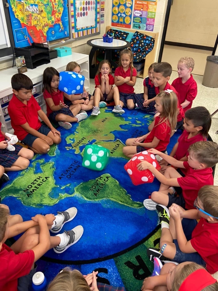 1st Graders were checking out the garden while eating their snack, working on 100s chart puzzles, and playing an ice breaker game to get to know their classmates! What a fantastic way to start the year.
