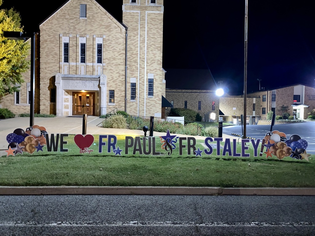 Outdoor Sign: "We [heart] Fr. Paul & Fr. Staley!"