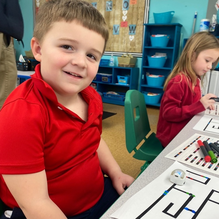 Kindergartners programmed the smallest robots at SFA, the Ozobots! 